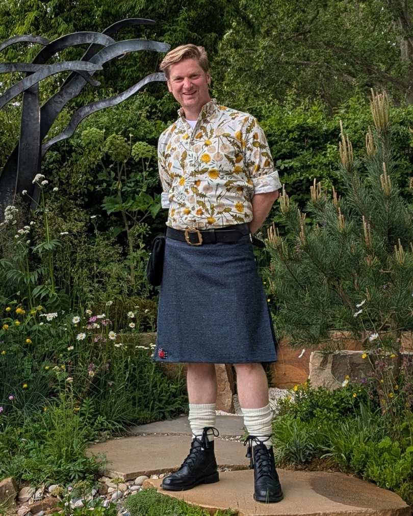 Ryan McMahon from Musa Landscape Architects standing in a garden he designed